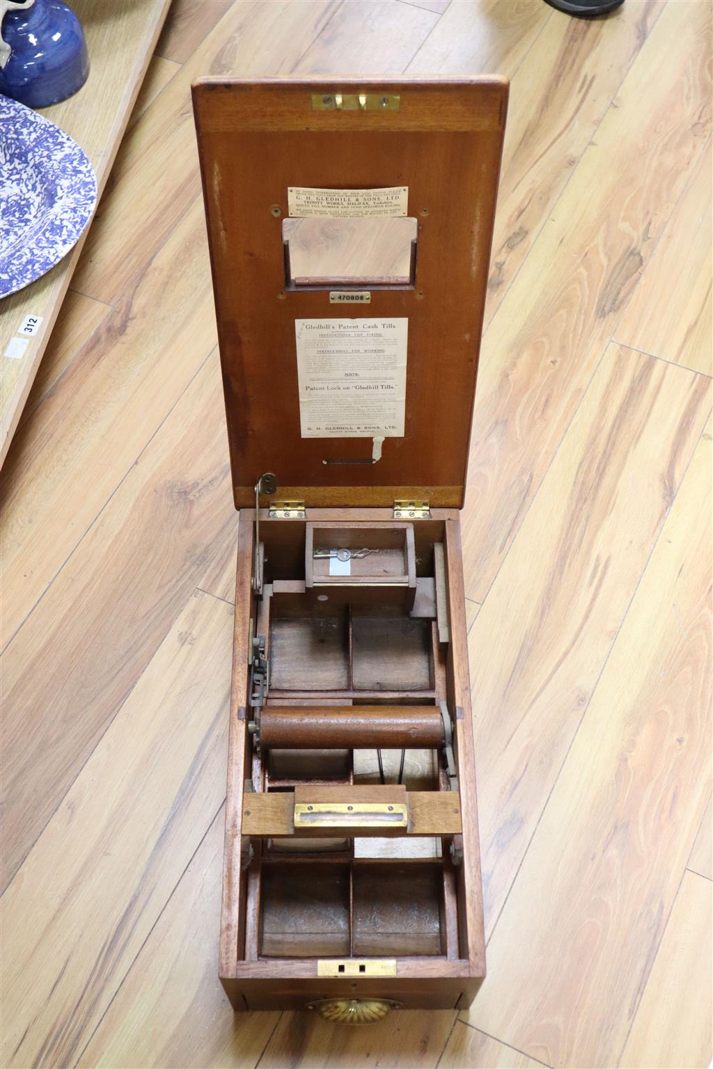 A late Victorian mahogany and brass cash register by Gledhill, Halifax